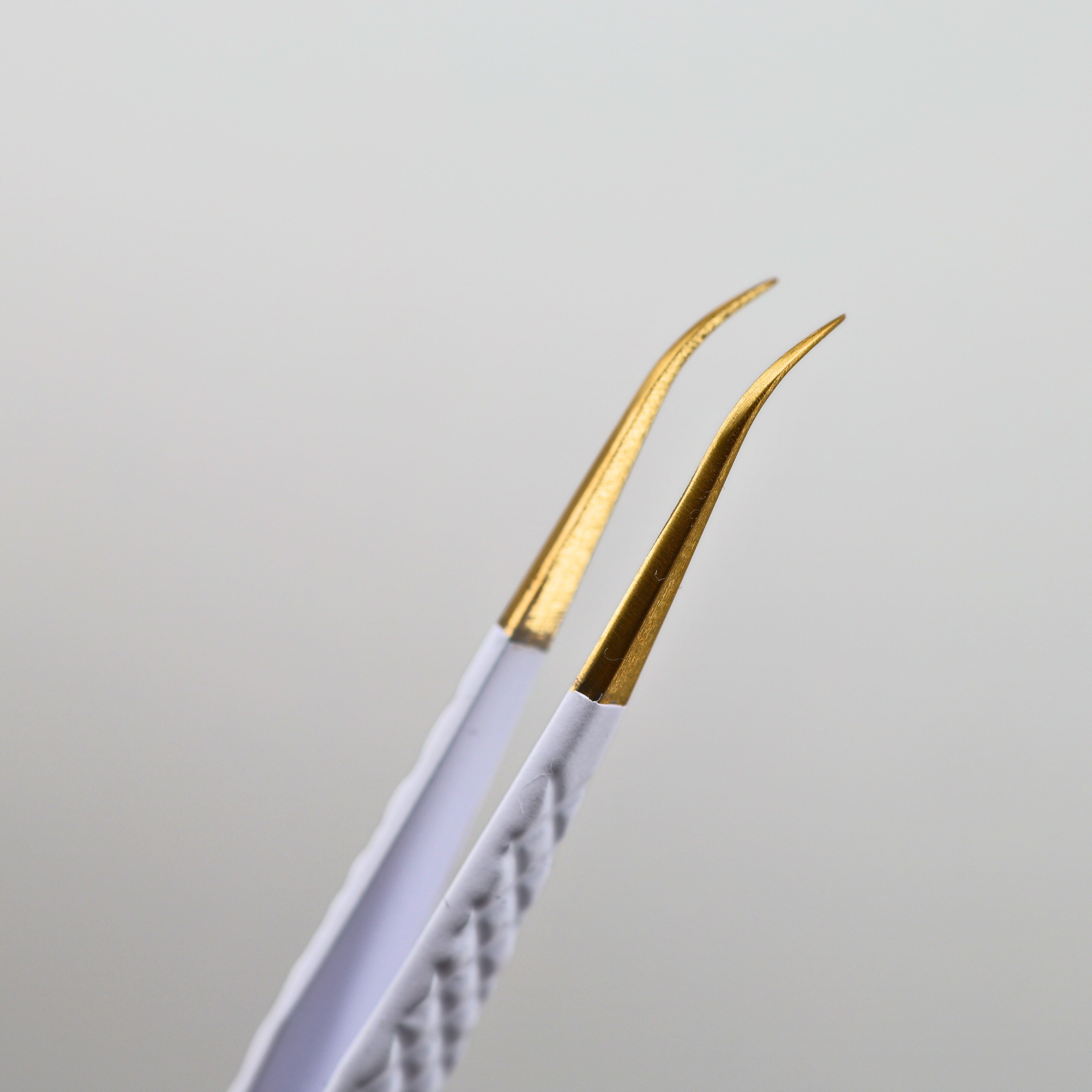 White & Gold: Curved Iso Tweezer